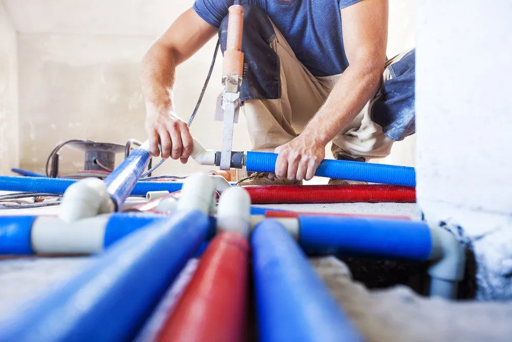 Professional plumber performing pipe repair and repiping services in Cape Coral FL homes